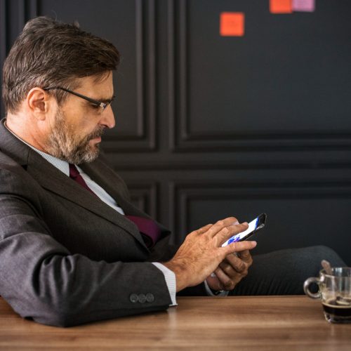 boss looking at the phone